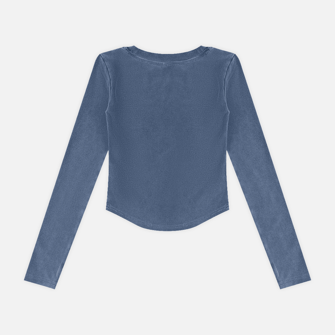 A slate blue long-sleeve crop top with a wide boat neckline, shown flat against a light gray background.