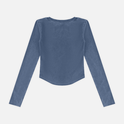A slate blue long-sleeve crop top with a wide boat neckline, shown flat against a light gray background.