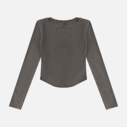 A long-sleeve cropped top in a washed charcoal gray color, shown from the back against a light gray background.