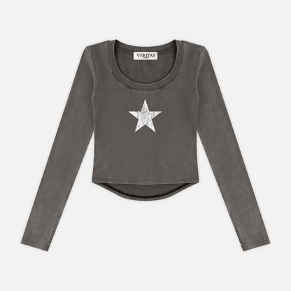 A dark gray long-sleeve crop top with a white star graphic on the chest, displayed flat against a light gray background. The brand name 'VERIJAS' is visible on the inner neck label.