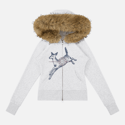 A light gray zip-up hoodie featuring a brown faux-fur trimmed hood and a graphic print of a running deer with a circular target on the chest, displayed against a light gray background.