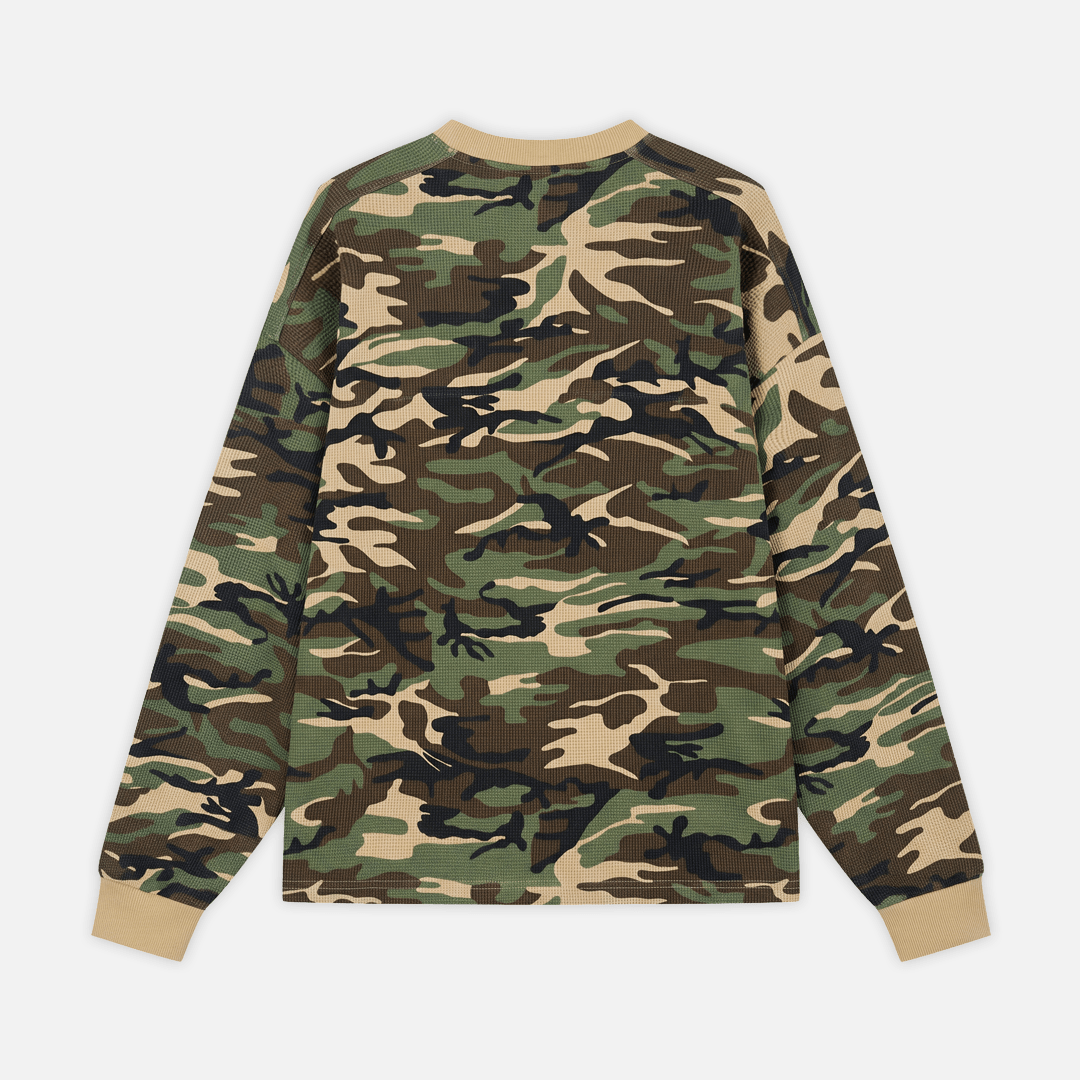A long-sleeve crewneck sweatshirt with a classic green, brown, black, and beige camouflage pattern, shown from the back against a light gray background.