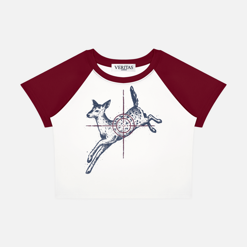 A short-sleeve raglan t-shirt with a white body and dark red sleeves, featuring a graphic of a jumping deer overlaid with a red crosshair and target design on the front. The brand name 'VERITAS' is visible on the inner neck label.