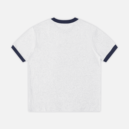 A gray short-sleeve ringer t-shirt shown from the back, featuring dark navy blue ribbed trim on the crew neck and sleeve cuffs, laid flat against a light gray background.